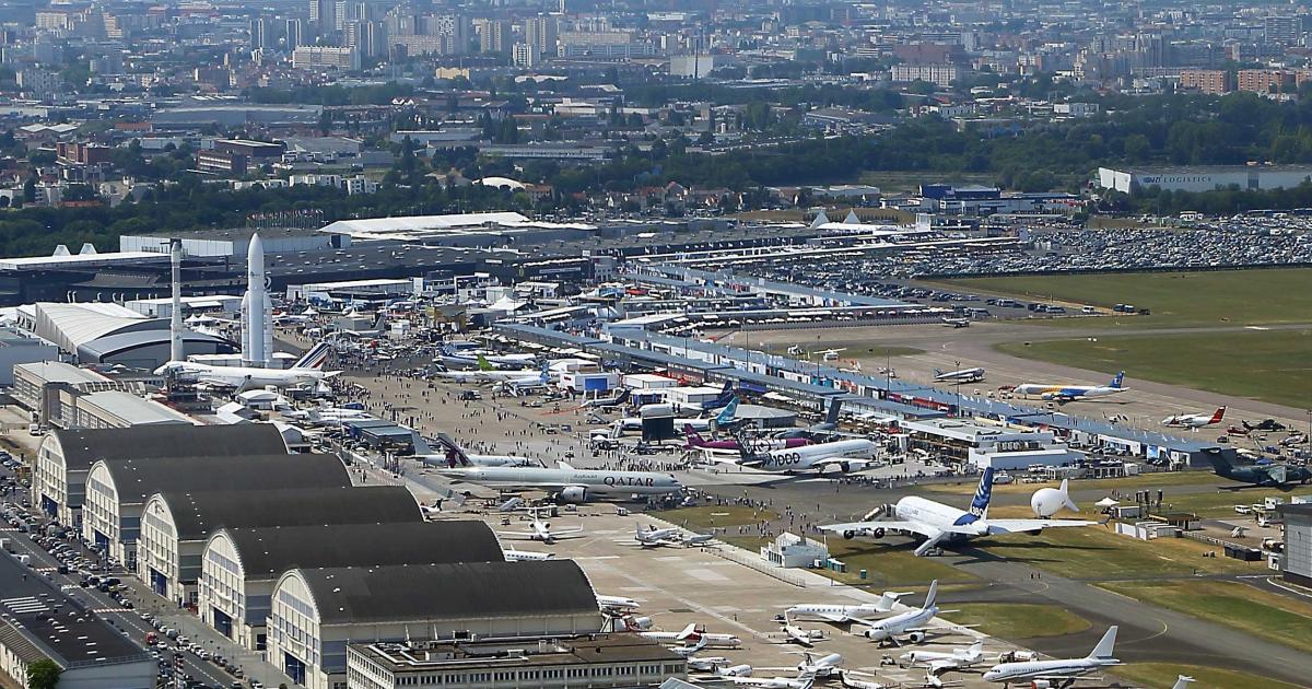 A view of Le Bourget Airport, with the Eiffel Tower in the distance, at the Paris Air Show 2017. (Photo: David McIntosh)