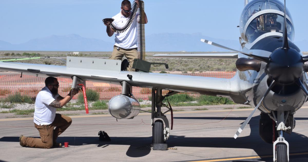 Support crew demonstrates austere rearming of A-29 Super Tucano at Holloman Air Force Base. (Photo: Bill Carey)