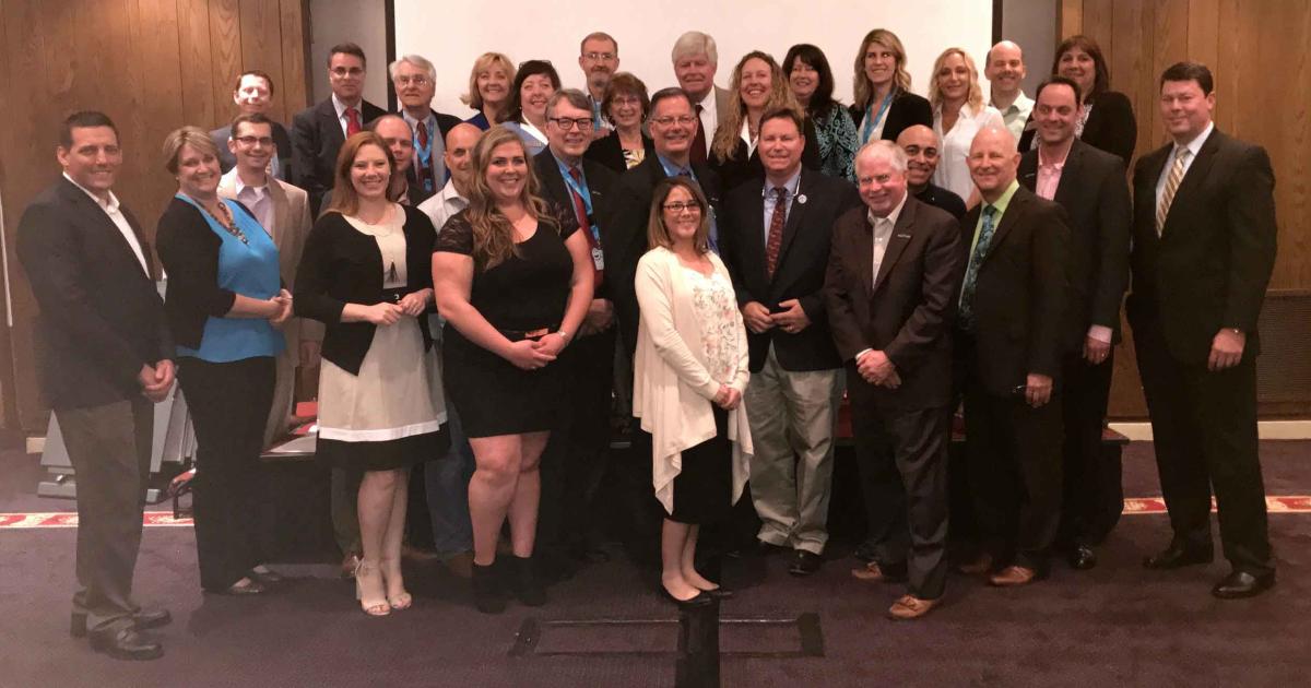 Members of the NBAA Local and Regional Group Committee gather at the annual Local and Regional Group Leadership Roundtable in Chicago this past May. (Photo: Brittany Davies)