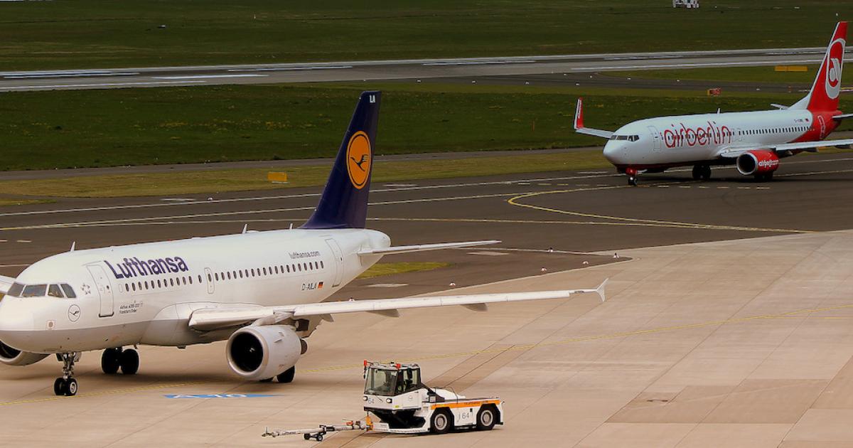 A Lufthansa Airbus Airbus A319 and an Air Berlin Boeing 737-800 taxi at Dusseldorf Airport. (Photo: Flickr: <a href="http://creativecommons.org/licenses/by-sa/2.0/" target="_blank">Creative Commons (BY-SA)</a> by <a href="http://flickr.com/people/calflier001" target="_blank">calflier001</a>)