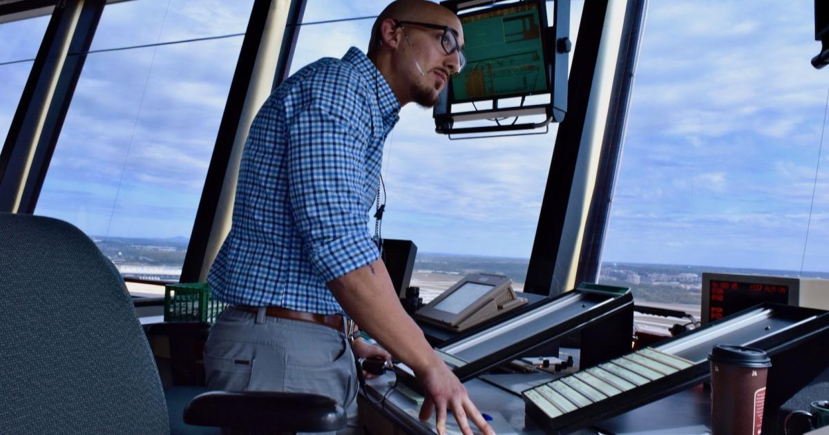 An FAA controller monitors the surface from the tower at Washington Dulles International Airport. (Photo: Bill Carey)