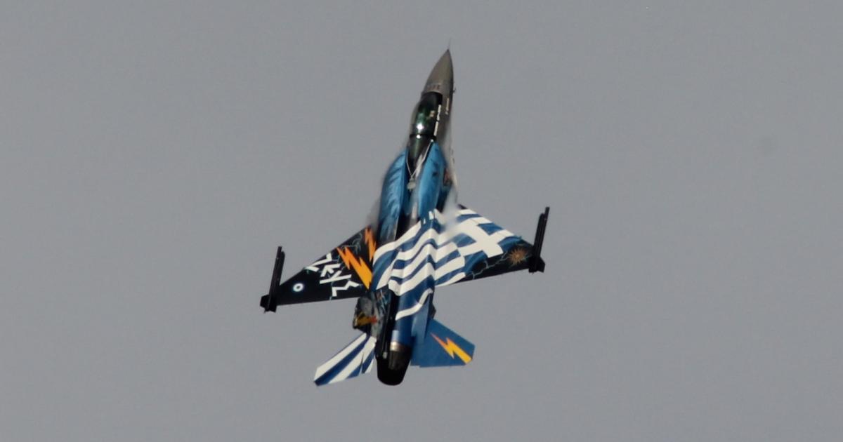 An F-16 with the Hellenic Air Force Zeus demonstration team performs at RIAT 2015 in the UK. (Photo: Chris Pocock)