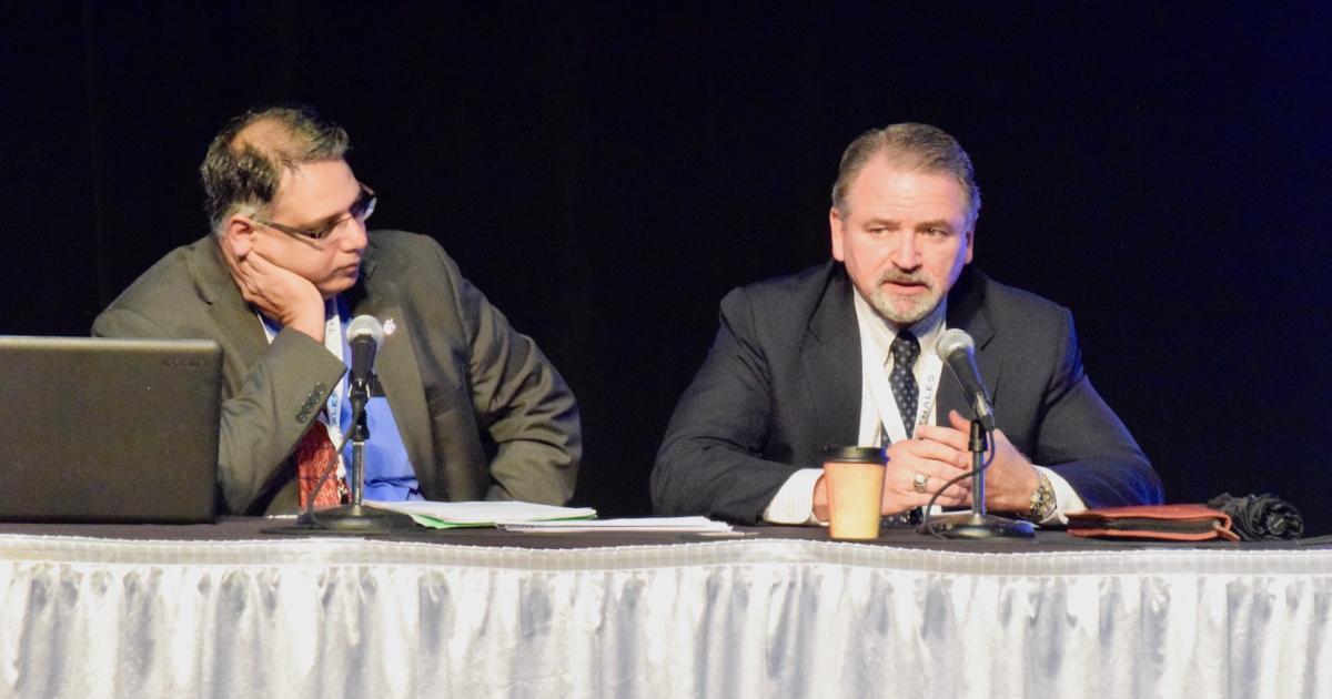 Marke Gibson, right, is shown with NASA's Parimal Kopardekar at Syracuse UTM conference in 2016. (Photo: Bill Carey)