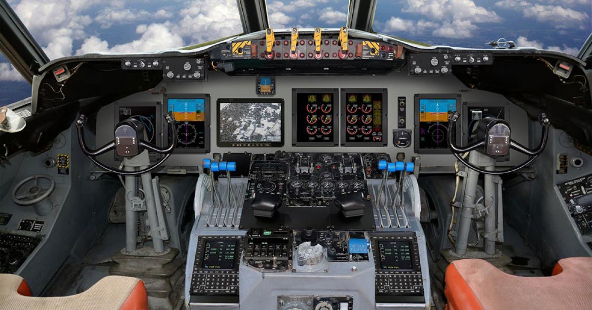  The Flight2 flight deck from Rockwell Collins updates  the original cockpit of the P-3B Orion with seven LCDs.