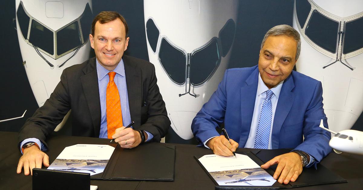 Bombardier Commercial Aircraft president Fred Cromer (left) and Egyptair CEO Safwat Musallam sign the ceremonial contract papers for an LOI covering 24 C Series CS300s. (Photo: David McIntosh)