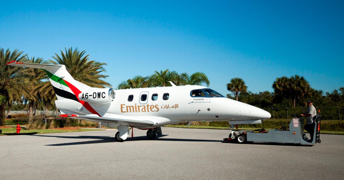 Emirates Flight Training Academy took delivery of the first of five Embraer Phenom 100EVs on November 8. It will use the entry-level business jets for advanced flight training. (Photo: Embraer)