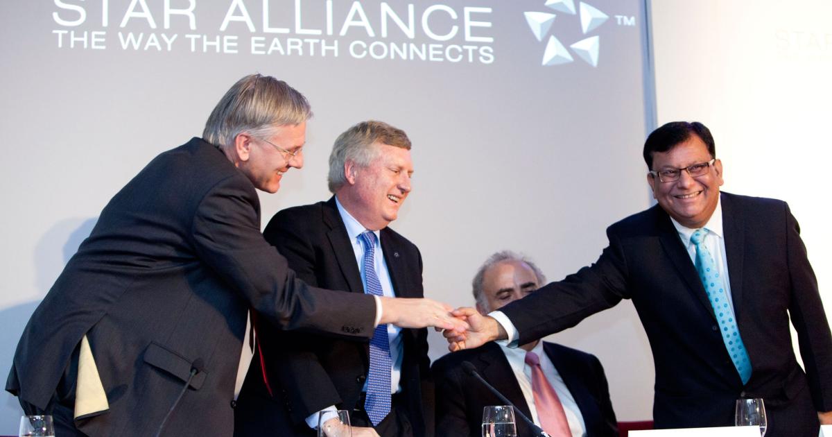 Lufthansa CEO Christoph Franz (far left) greets Rohit Nandan, Air India chairman and managing director (far right), following the December 13 Star Alliance board meeting in Vienna as Star Alliance CEO Mark Schwab (center left) and Air Canada CEO Calin Rovinescu (center right) look on. (Photo: Star Alliance)