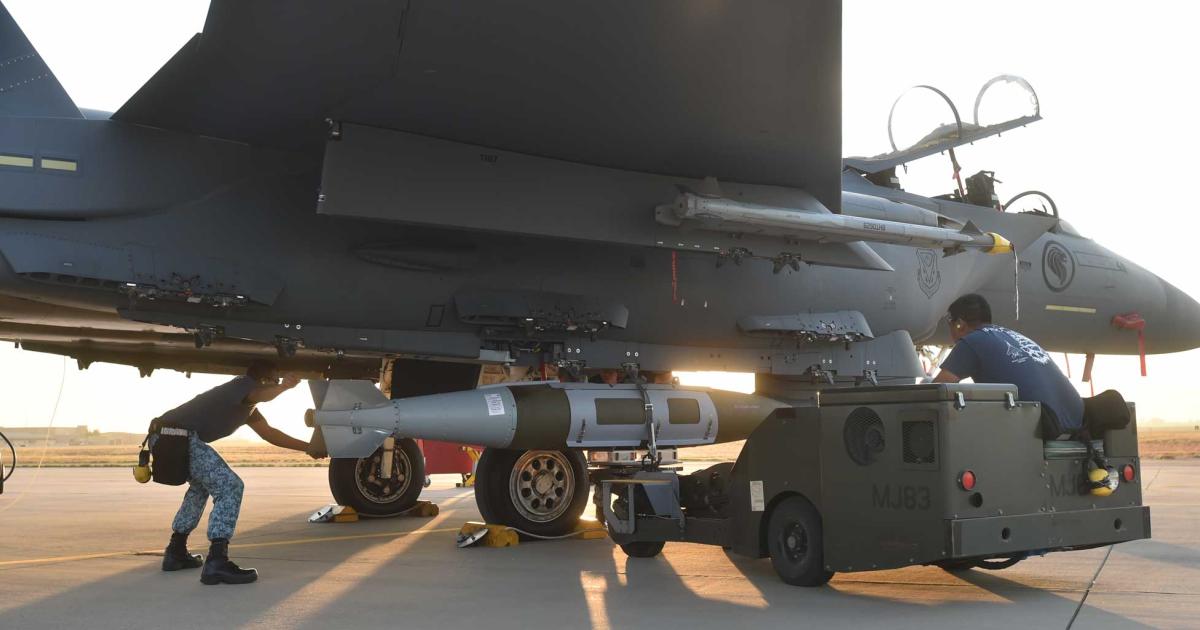 Used for the first time in the RSAF’s “Forging Sabre” exercise, a 2,000-lb GBU-31 JDAM is being loaded onto an F-15SG. 