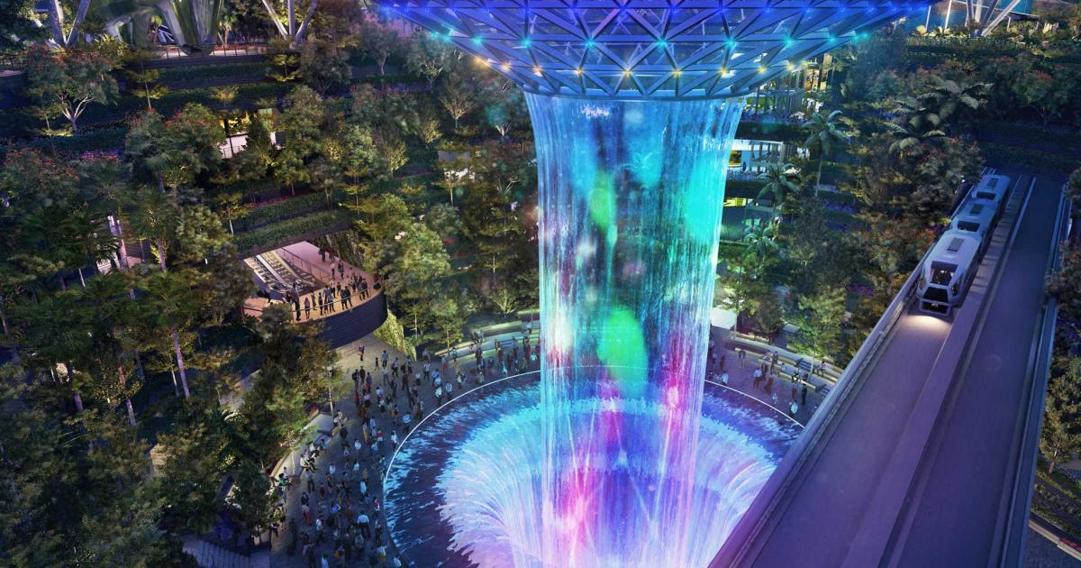 Jewel Changi Airport, a mixed-use terminal complex due to open next year, features this 131-foot indoor waterfall, known as the Rain Vortex. Now under construction, the complex will consist of leisure, retail, and hotel elements as well as airport operations.