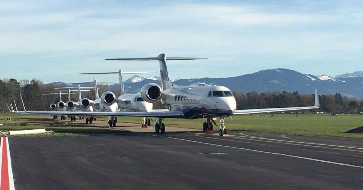 Private aviation traffic to this year's World Economic Forum broke records once again. These bizjets were lined up on the ramp at St. Gallen-Altenrhein Airport. Execujet signed an agreement with the airport to help manage the FBO there in November.