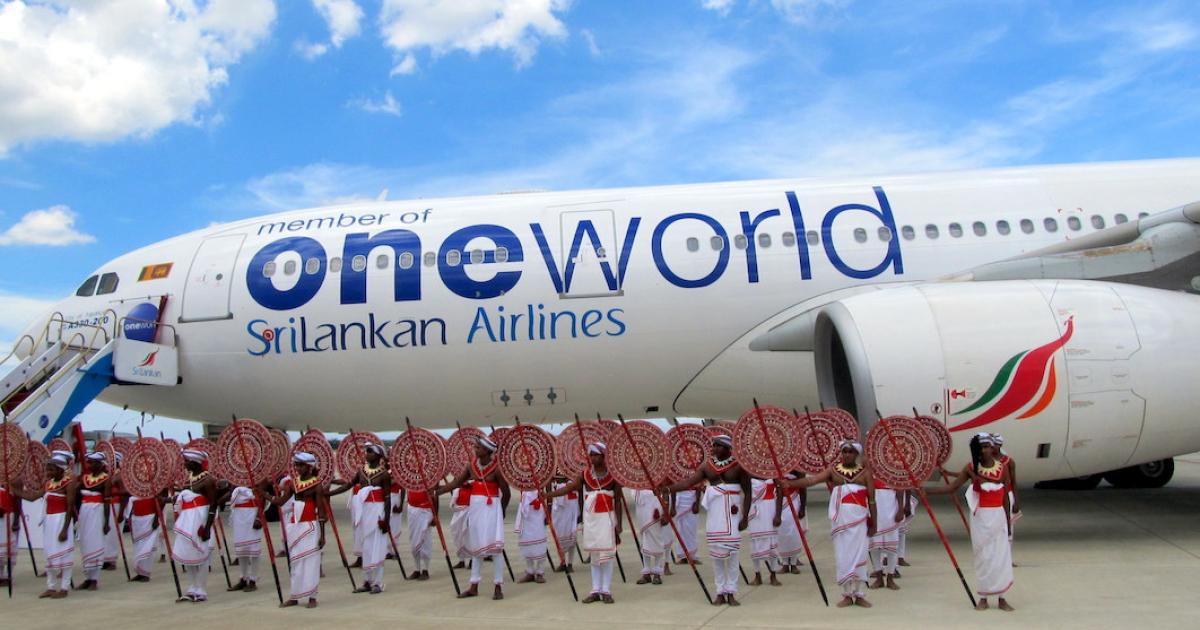 Performers dressed as ancient Sri Lankan warriors mark SriLankan Airlines' entry into the Oneworld alliance in 2014.