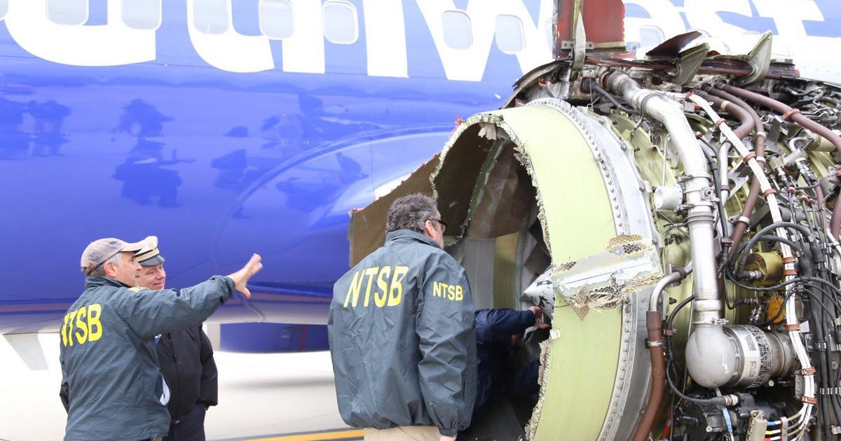 Members of an NTSB "go team" inspect the CFM56-7B turbofan that broke apart during a Southwest Airlines flight from New York to Dallas. (Photo: NTSB)
