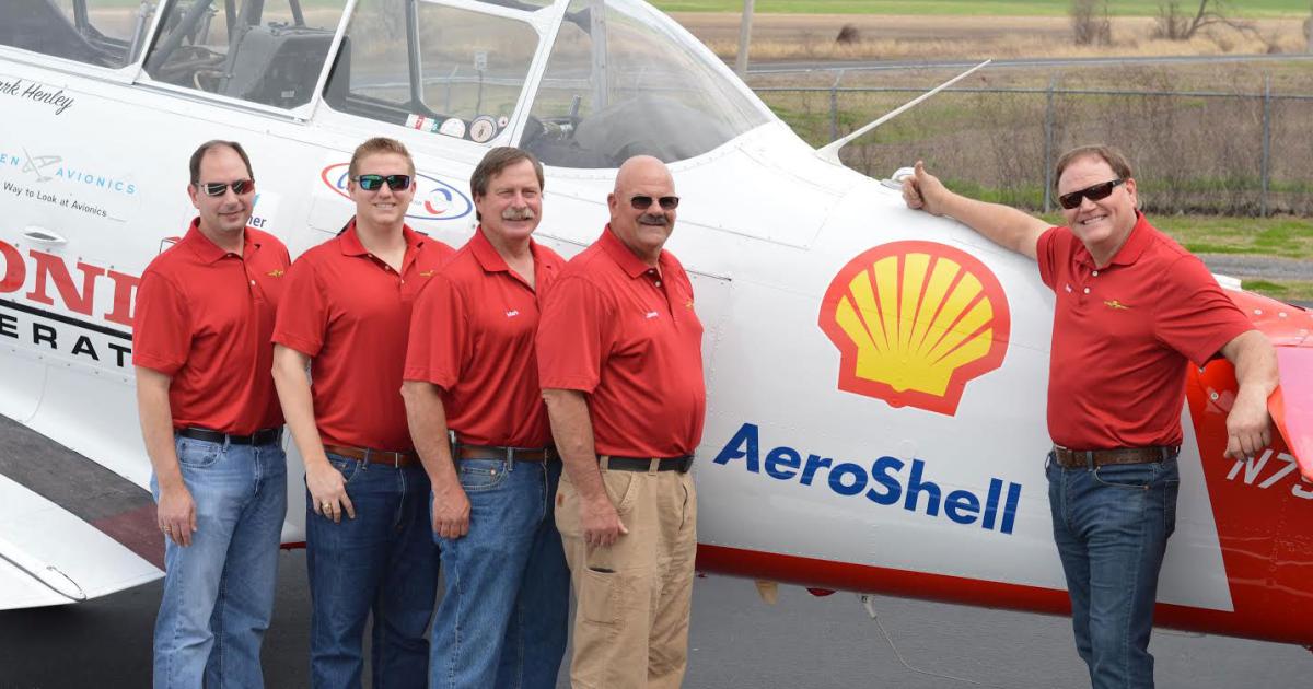 Members of the Shell Aviation Lubricants Team and AeroShell Aerobatic Team celebrate the signing of the new agreement in Tallulah, Louisiana. From left to right: Jon Stoy, general aviation manager, and Rodney Eckert, marketing manager, from Shell Aviation Lubricants, with Mark Henley, team lead, Jimmy Fordham, slot, and Steve Gustafson, left wing, from the AeroShell Aerobatic Team.