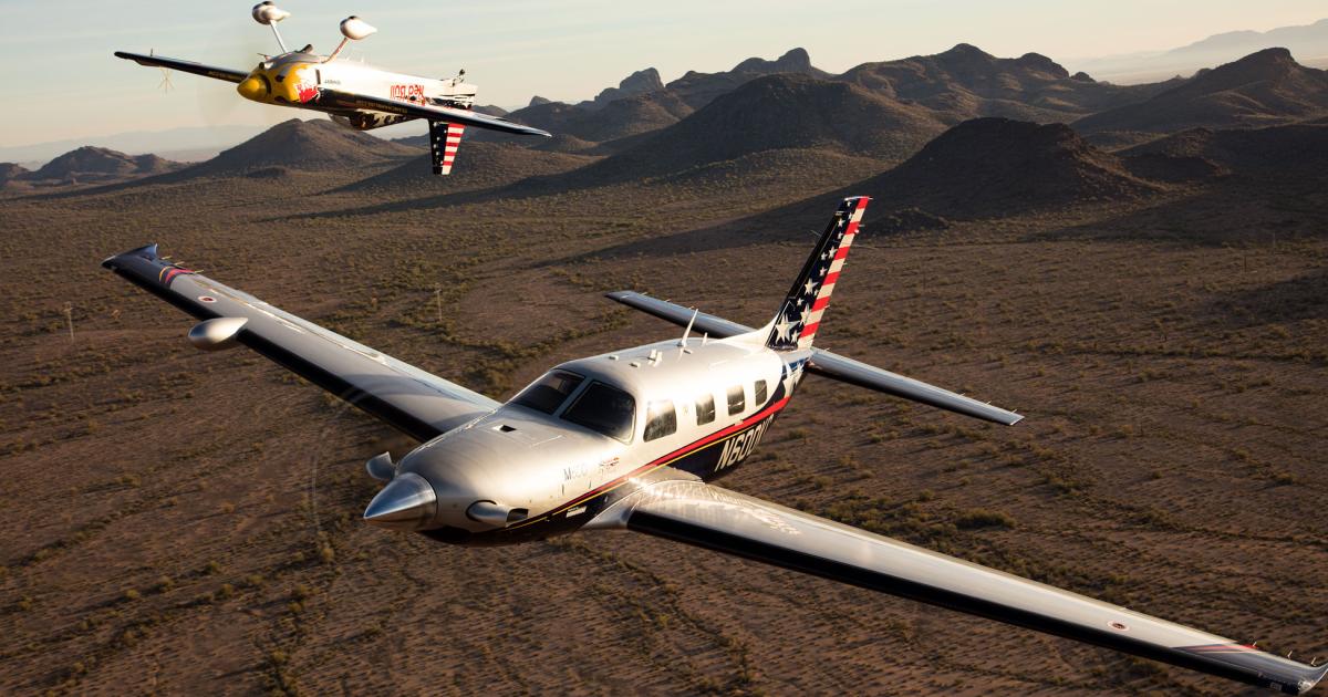 Kirby Chambliss’s custom M600 flies with his matching Edge 540. (Photo: Piper Aircraft)
