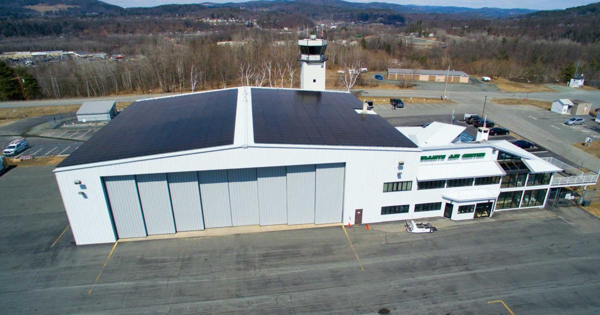 In addition to generating energy, over the course of its lifetime, the massive solar array now adorning the hangar roof at New Hampshire's Granite Jet Center will offset the same amount of carbon emissions as a car driving more than 11 million miles.