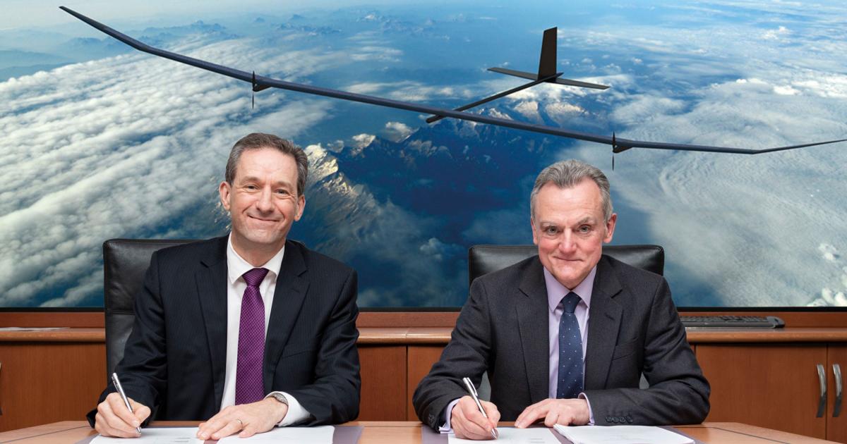Paul Brooks, managing director of Prismatic Ltd (left) and Michael Christie, strategy director, BAE Systems Air Sector (right) sign their partnership agreement. (Photo: BAE Systems)