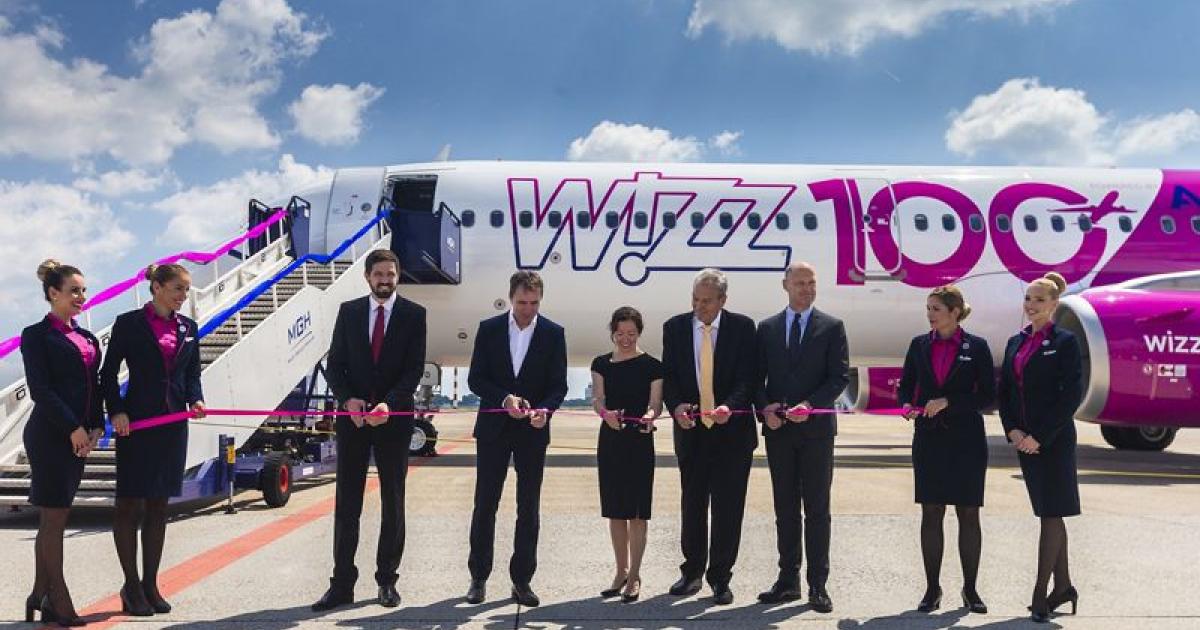 Executives from Airbus, Wizz Air, and Pratt & Whitney join Hungarian government officials during a ceremony at Budapest Airport that marked delivery of Wizz Air’s 100th Airbus A320-family jet. (Photo: Airbus) 