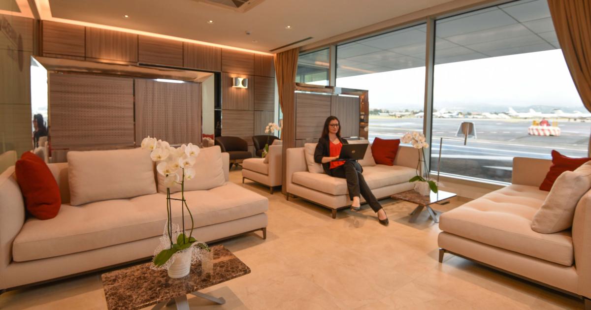 The VIP passenger lounge at the newly renovated Universal FBO at Rome Ciampino Airport features “Italian style” colors and materials, and offers a view of the apron with Roman castles and Castel Gandolfo in the background. (Photo: Universal Aviation)