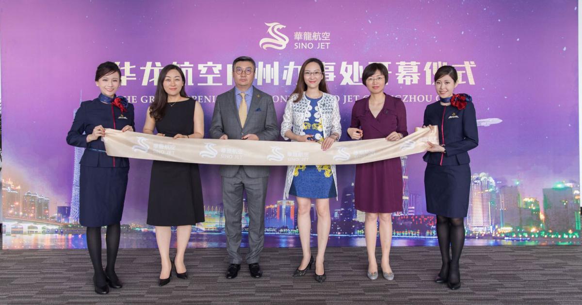 Frank De (center left), CEO of Sino Jet Hong Kong, and Jenny Lau (center right), president of Sino Jet, are two of the many VIPs who attended the opening of the Guangzhou Office. (Photo: Sino Jet)