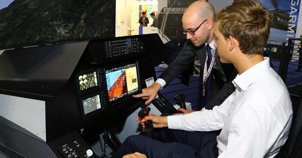 Garmin International’s fighter cockpit simulator features dual Garmin touchscreen controllers, as well as a seamless interface between the integrated flight deck and L3’s ForceX Widow mission computer.