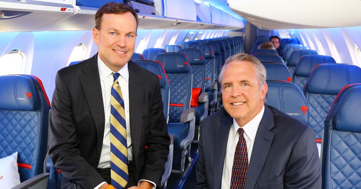 Fred Cromer, left, Bombardier Commercial Aircraft president, and Daniel Pietrzak, Delta Air Lines managing director, fleet transactions view the newest regional jet interior as a “game changer.” The Atmosphère design is the result of two year’s research and internal work. 