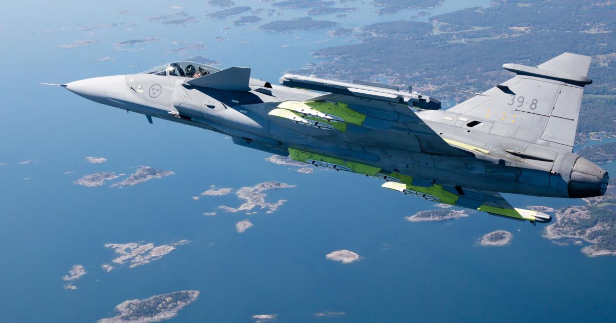 The first Gripen E flew over Sweden’s Baltic coastline during its first flight with weapons pylons installed. It also carried iris-T air-to-air missiles on the wingtip launch rails. The new-generation Gripen is on schedule to enter service next year with Sweden and Brazil.
