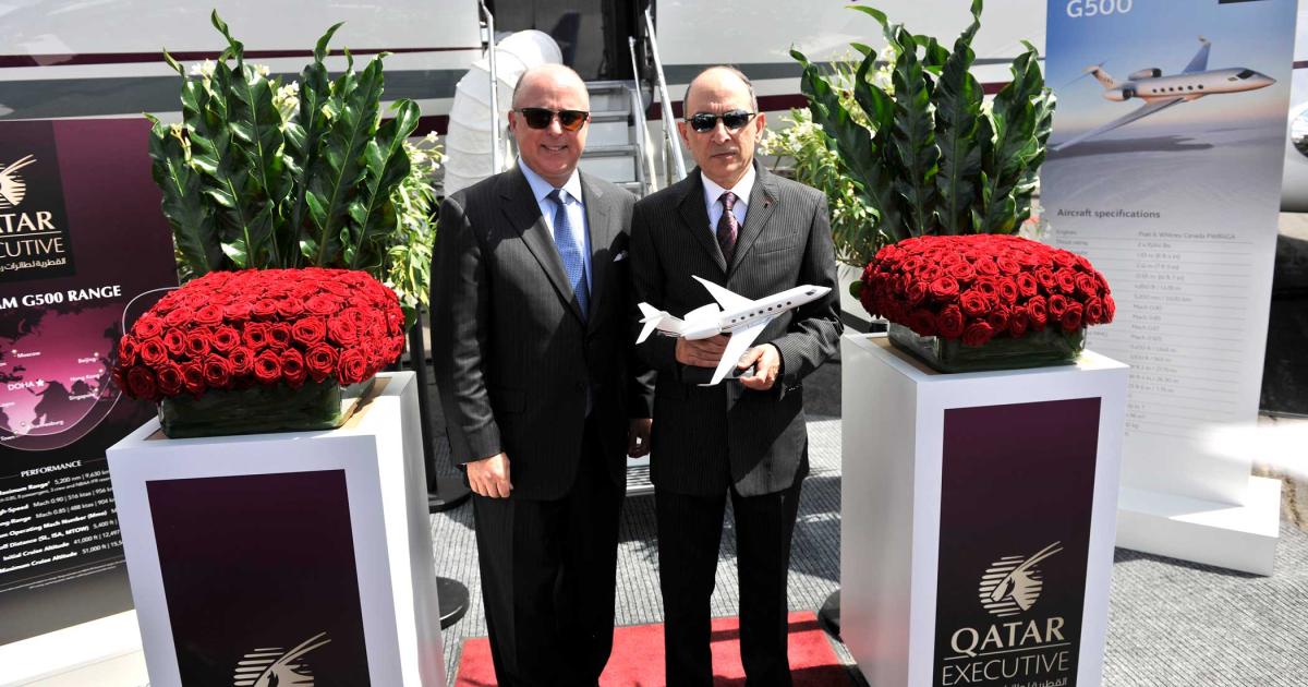 Scott Neal Gulfstream SVP world wide sales and Qatar Airways Group chief executive Akbar Al Baker.