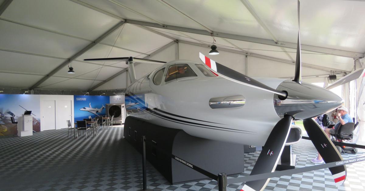 A new full-size mockup of Textron Aviation's Cessna Denali turboprop single is on display this week at EAA AirVenture 2018 in Oshkosh, Wisconsin. It features a flight deck with functioning Garmin G3000 avionics, updated interior, and composite McCauley five-blade propeller. (Photo: Mark Huber/AIN)