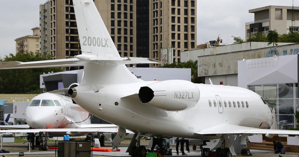 Dassault brought two of its large-cabin jets to LABACE 2018, its flagship fly-by-wire, three-engine Falcon 8X (rear) and a pristine Falcon 2000LX. (Photo: David McIntosh)
