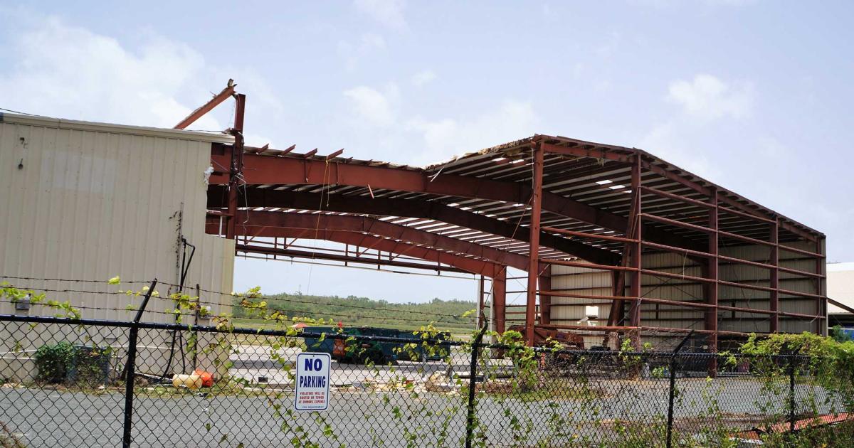 Nearly a year after it was shredded by Hurricane Maria, the Bohlke International Airways FBO at St. Croix's Henry E. Rohlsen Airport is finally being dismantled after extensive insurance negotiations. The facility will be replaced with an 8,000-sq-ft terminal and 30,000-sq-ft hangar at a cost of more than $5 million.