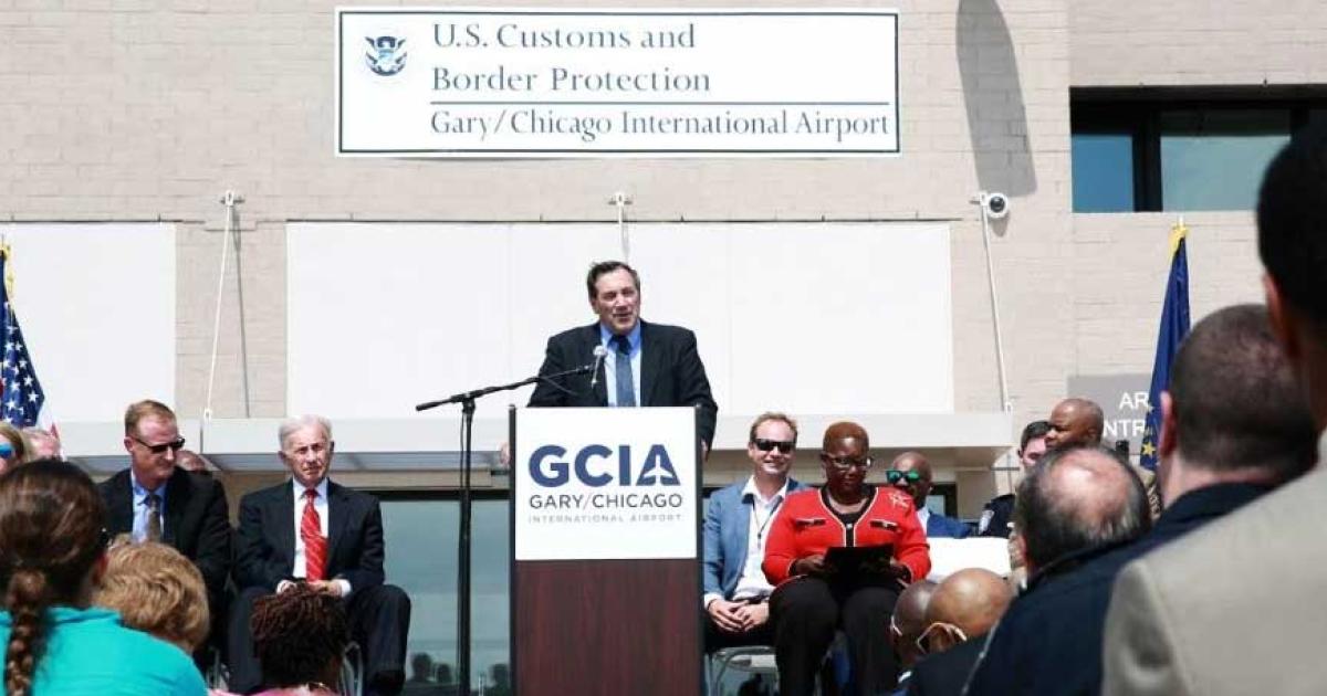 U.S. Senator Joe Donnelly (D.-Ind.) addresses the crowd at the opening ceremony of Gary/Chicago International Airport's new Customs and Border Protection facility on Aug. 8. The onsite CBP location will allow incoming international private aviation flights to fly directly to the airport.