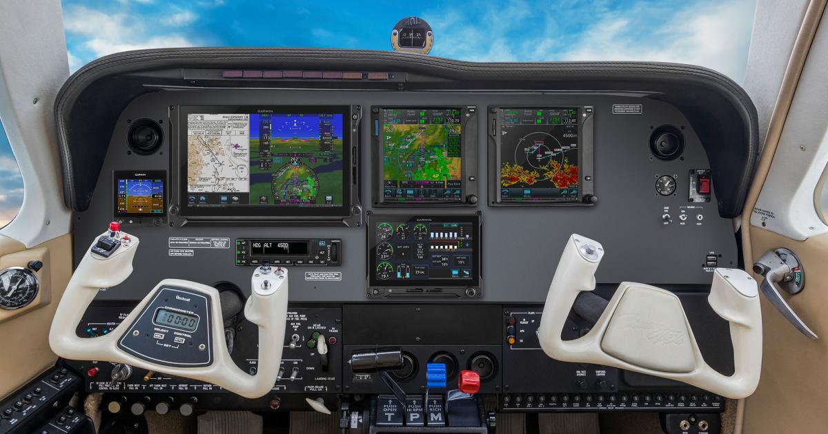A Beechcraft Bonanza with a full complement of Garmin avionics, including a GFC 600 autopilot, touchscreen TXi displays, GTN 750 touchscreen navigators, and a G5 as a standby instrument.