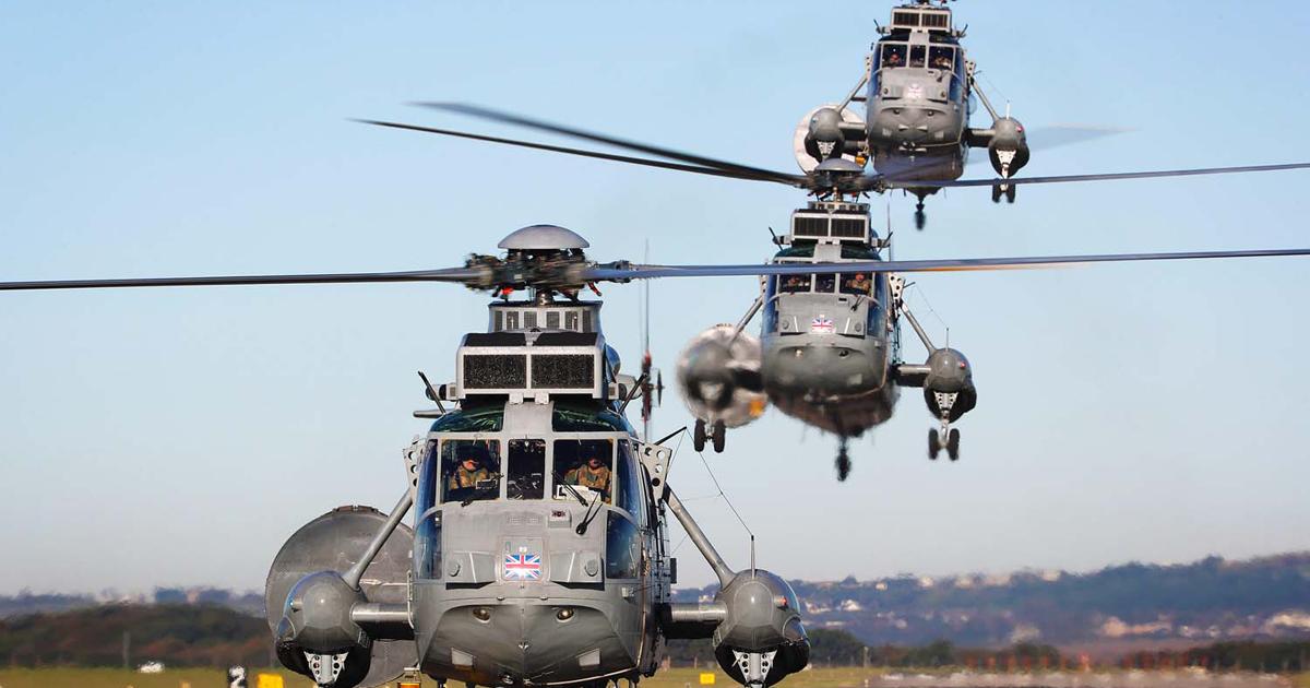 The UK's last military Sea Kings touch down for the last time after delivery into storage. (photo: Royal Navy)