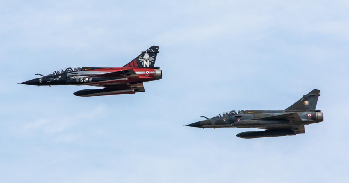 A pair of Mirage 2000Ns undertakes a final flypast at Istres on August 30. One of the aircraft wears a special scheme to commemorate the 2000N's 30 years of service. (photo: Armée de l'Air)