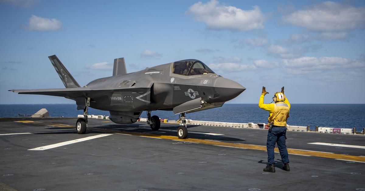An F-35B from VMFA-211 prepares to launch from Essex in the days before the first combat action. It has a 25mm cannon pod installed under the fuselage. (photo: U.S. Navy)
