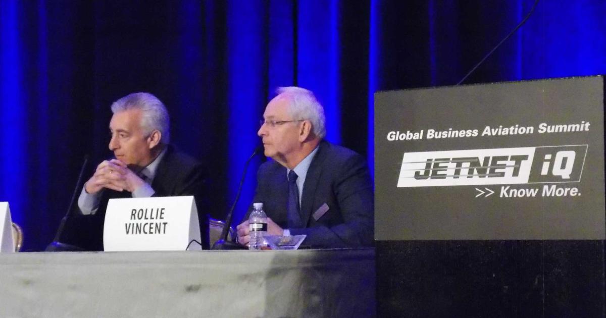 (l-r) Jetnet vice president of sales Paul Cardarelli and Jetnet iQ creator and director Rolland Vincent field questions from the audience at this year's Jetnet iQ Summit in June. (Photo: Curt Epstein)