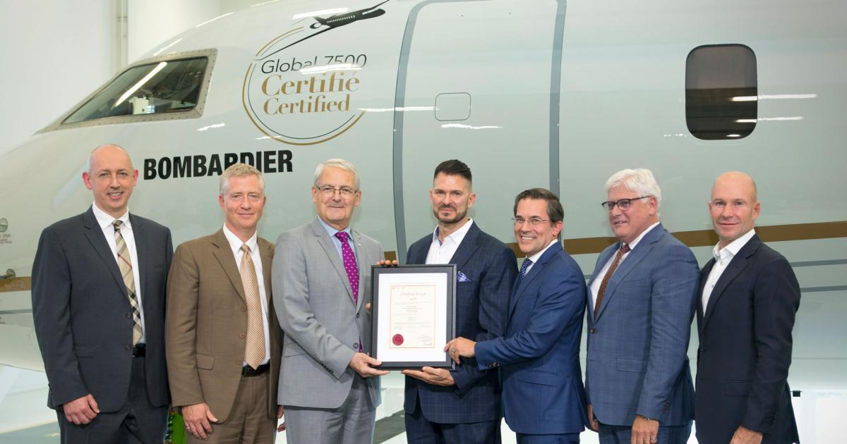 Bombardier's Global 7500 received Transport Canada certification today. On hand for the milestone were (left to right): Stephen McCullough, vice president, integrated product development team, Global 7500 and Global 8000; David Turnbull, director, national aircraft certification, Transport Canada; Marc Garneau, minister of transport; David Coleal, president, Bombardier Business Aircraft; Michel Ouellette, senior vice president, Global 7500 and Global 8000 program; François Caza, vice president, product development and chief engineer, product development engineering, aerospace, Bombardier; and Alain Bellemare, president and CEO, Bombardier. (Photo: Bombardier)
