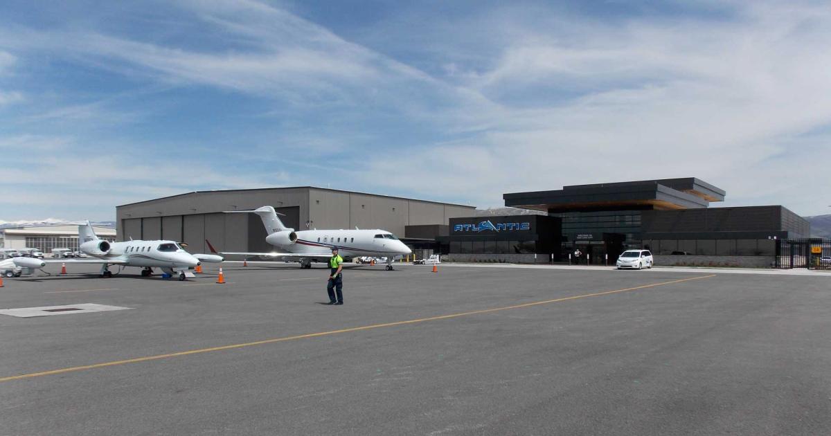 Atlantic Aviation held the grand opening for its more than $25 million FBO at Salt Lake City International Airport in April. To the left of the 12,700 sq ft terminal is one of the two new 30,000 sq ft hangars that are now part of the 17-acre complex. (Photo: Curt Epstein)