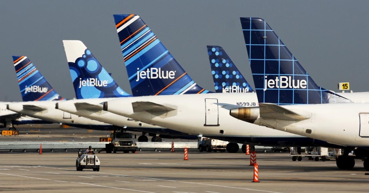 JetBlue Airbus A320s stand ready for service at New York JFK International Airport. (Photo: JetBlue)