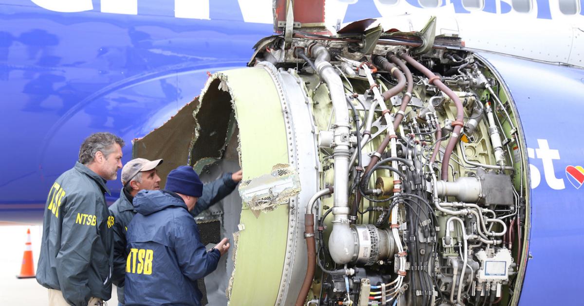 NTSB inspectors examine the CFM56-7B turbofan that failed during an April 18 flight from New York to Dallas. (Photo: NTSB) 