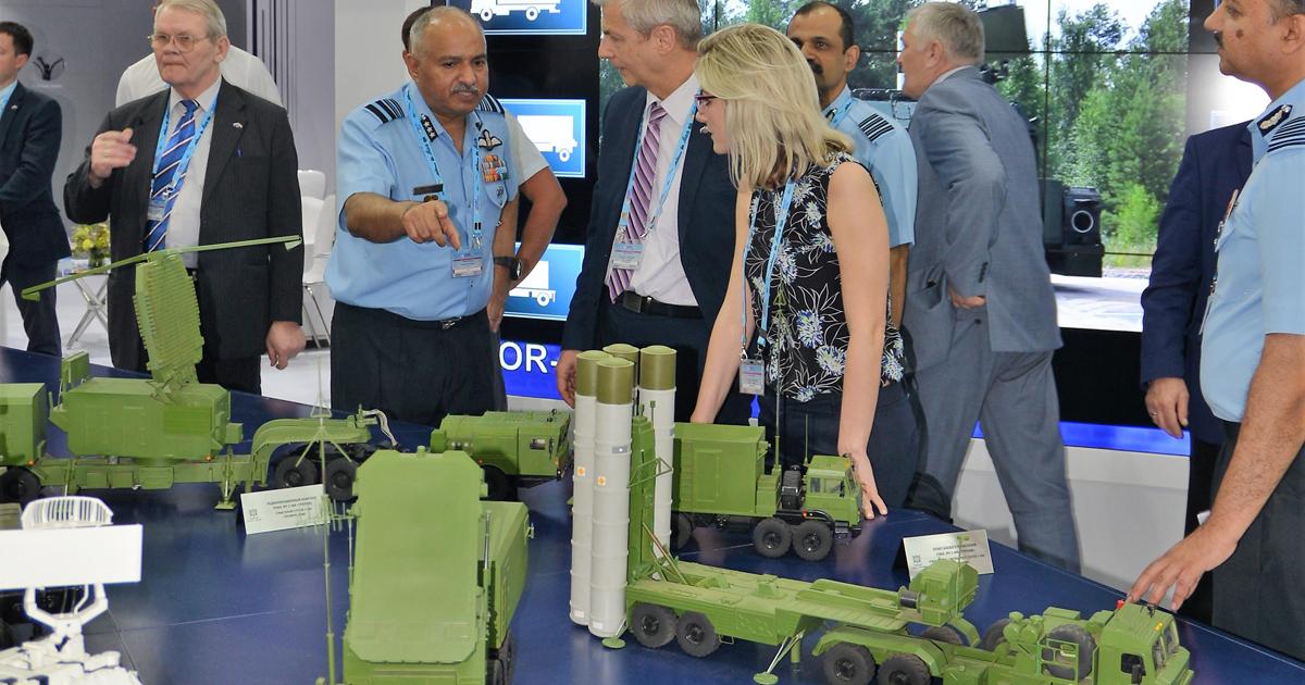 Air Marshal Raghunath Nambiar, then head of procurement for the Indian Air Force, discusses the S-400 system with Almaz-Antey officials during the Defexpo 2018 show. In early October he took over  as the new Air Officer Commanding-in-Chief of the Indian Air Force’s Eastern Air Command at Meghalaya. (photo: Vladimir Karnozov)
