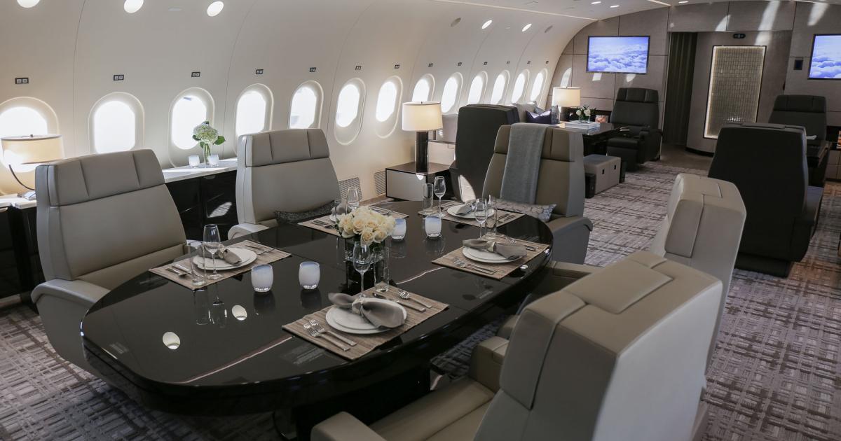 Greenpoint Technologies recently delivered its second VIP completion project for a Boeing 787-8. The layout features both open space areas, such as this dining room, and private rooms, including a master grand suite. (Photo: Greenpoint Technologies)