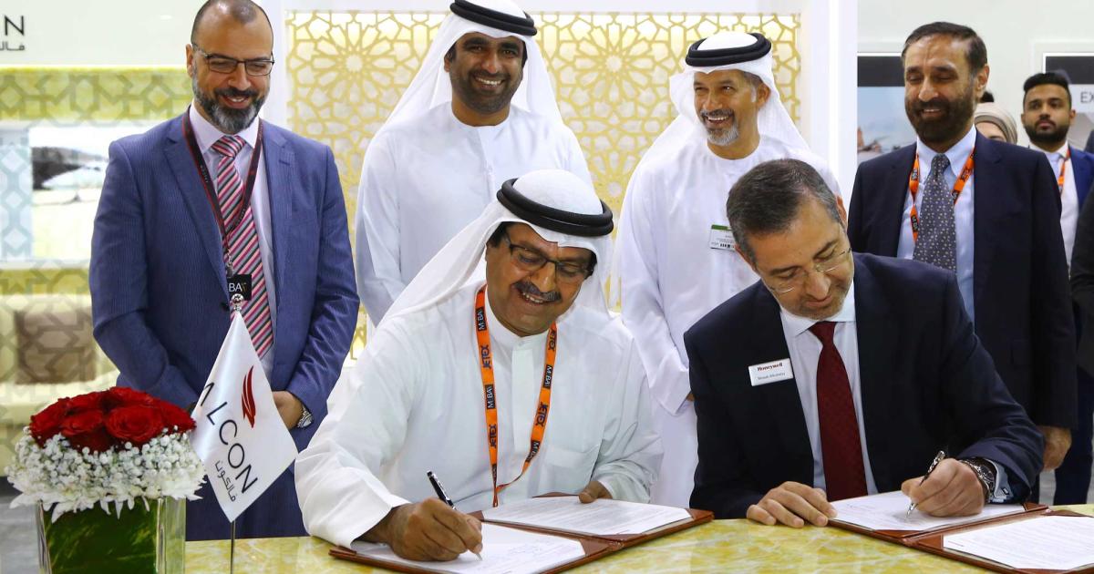 Falcon Aviation’s managing director Mahmood Hussain (l) and Honeywell Aerospace’s Mosab Alkubaisy, director Middle East and Africa sign a new partnership agreement at MEBAA 2018.