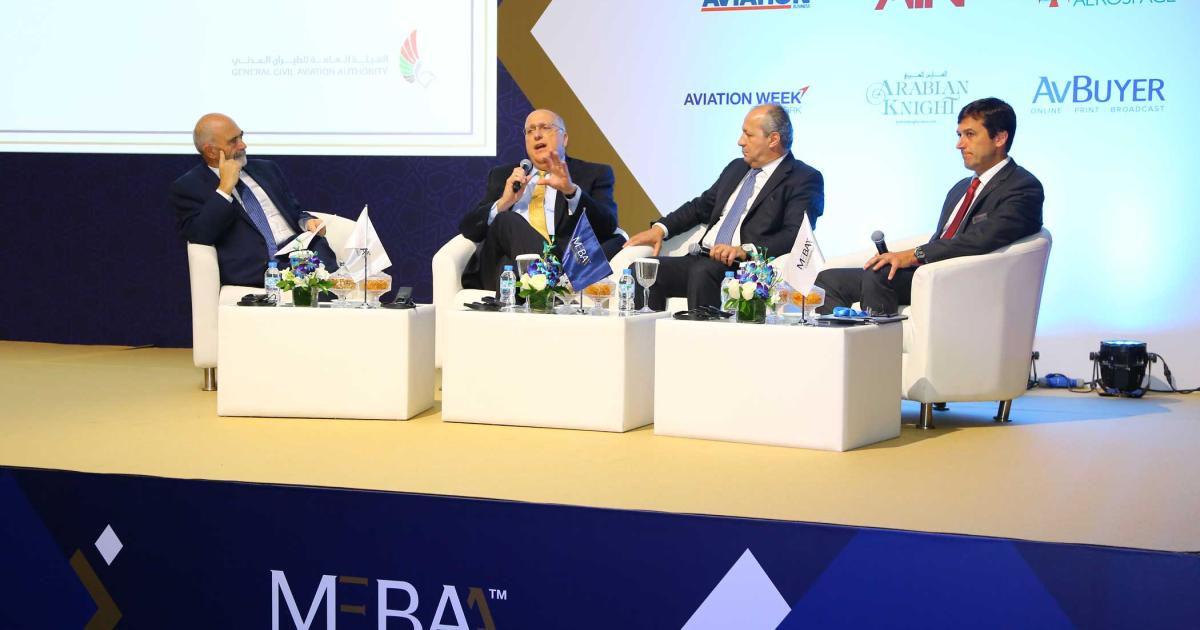 Claudio Camelier (right), v-p sales, Middle East and Asia Pacific, Embraer Executive Jets, alongside Khader Mattar (2nd r), v-p sales, MEA, Asia Pacific and China, Bombardier, and Steve Cass, (2nd l) v-p, sales development and support, Gulfstream. Alan Peaford, (left), editor-in-chief, Arabian Aerospace, acted as the conference’s master of ceremonies.