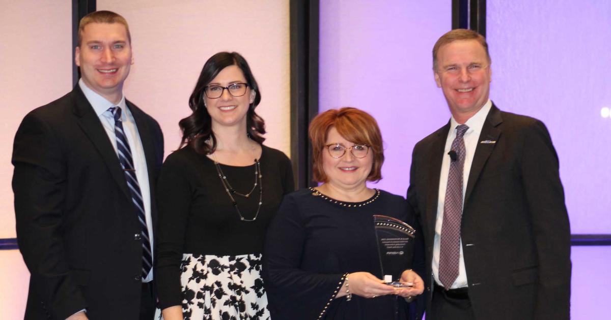 (l-r) Schedulers & Dispatchers 2019 Conference co-chairs Derek Fitzgerald and Kindra Mahler with Kellie Rittenhouse, Schedulers & Dispatchers Outstanding Achievement and Leadership Award winner, and NBAA president and CEO Ed Bolen. (Photo: Jerry Siebenmark)



