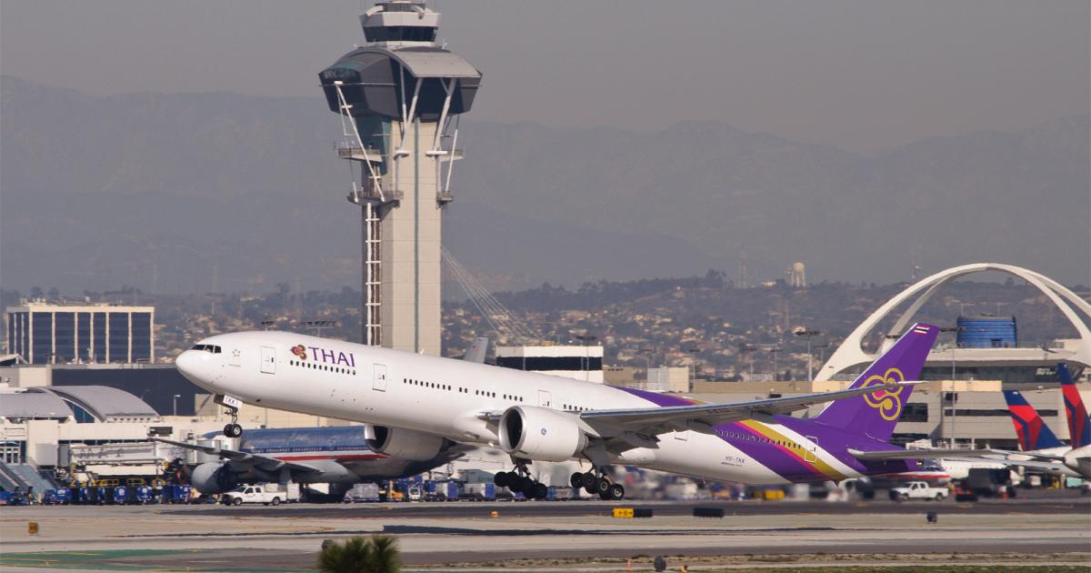 A Thai Airways Boeing 777-300ER takes off from Los Angeles International Airport in 2013. (Photo: Flickr: <a href="http://creativecommons.org/licenses/by-sa/2.0/" target="_blank">Creative Commons (BY-SA)</a> by <a href="http://flickr.com/people/skinnylawyer" target="_blank">InSapphoWeTrust</a>)