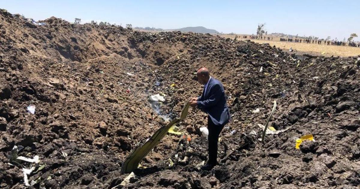 Ethiopian Airlines CEO Tewolde Gebremariam inspects wreckage from Flight ET 302 outside Addis Ababa. (Photo: Ethiopian Airlines)