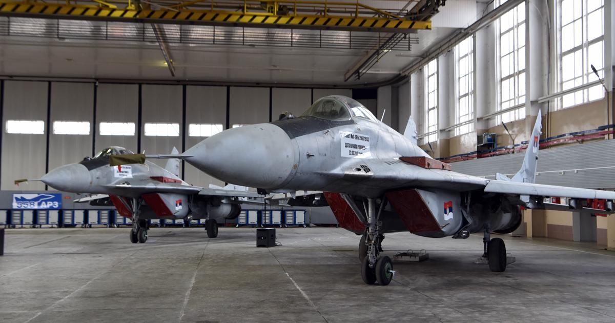 Two of Serbia's four latest MiG-29s are seen during the handover ceremony in the 558 aircraft repair plant at Baranovici, where they are undergoing refurbishment and modernization. (Photo: Serbia ministry of defense)