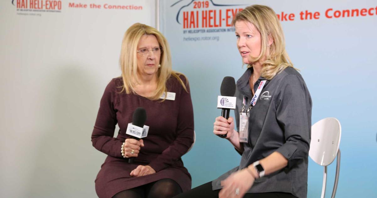 HAI v-p of business development Karen Gebhart (l) and Abby Hutter, JSfirm manager of marketing and partnerships, discuss JSfirm's partnership with HAI to boost industry job hiring. 