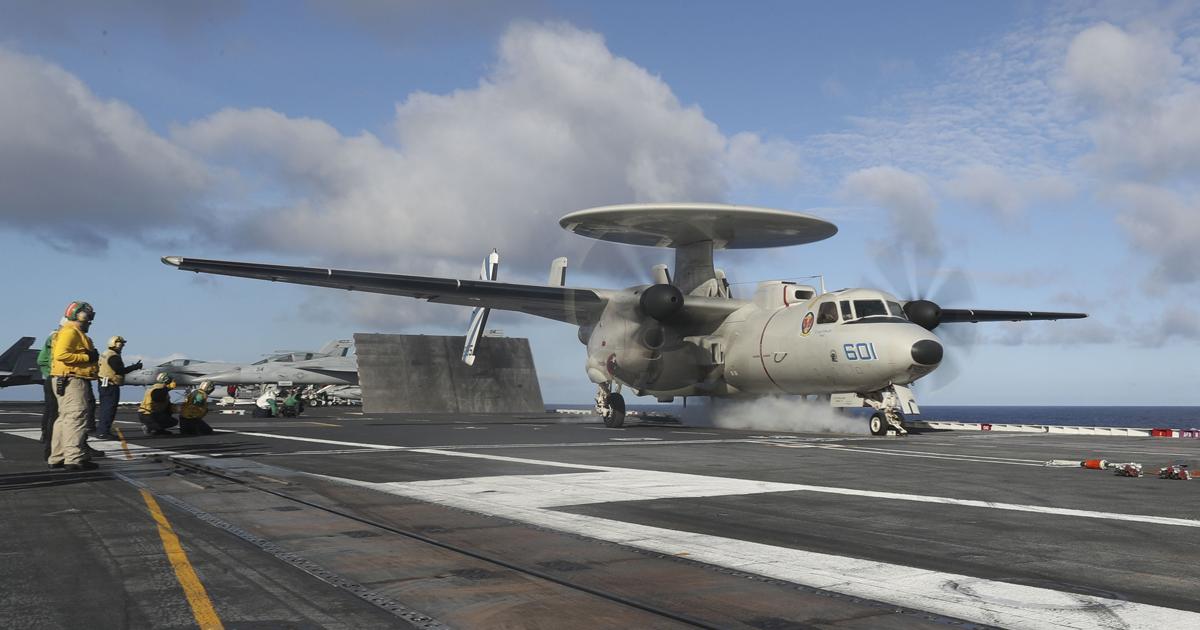 An E-2D Advanced Hawkeye of VAW-121 “Bluetails” launches from USS Abraham Lincoln in early April. The AHE is replacing the E-2C “Charlie,” with the process now around 55 percent complete. (Photo: U.S. Navy)